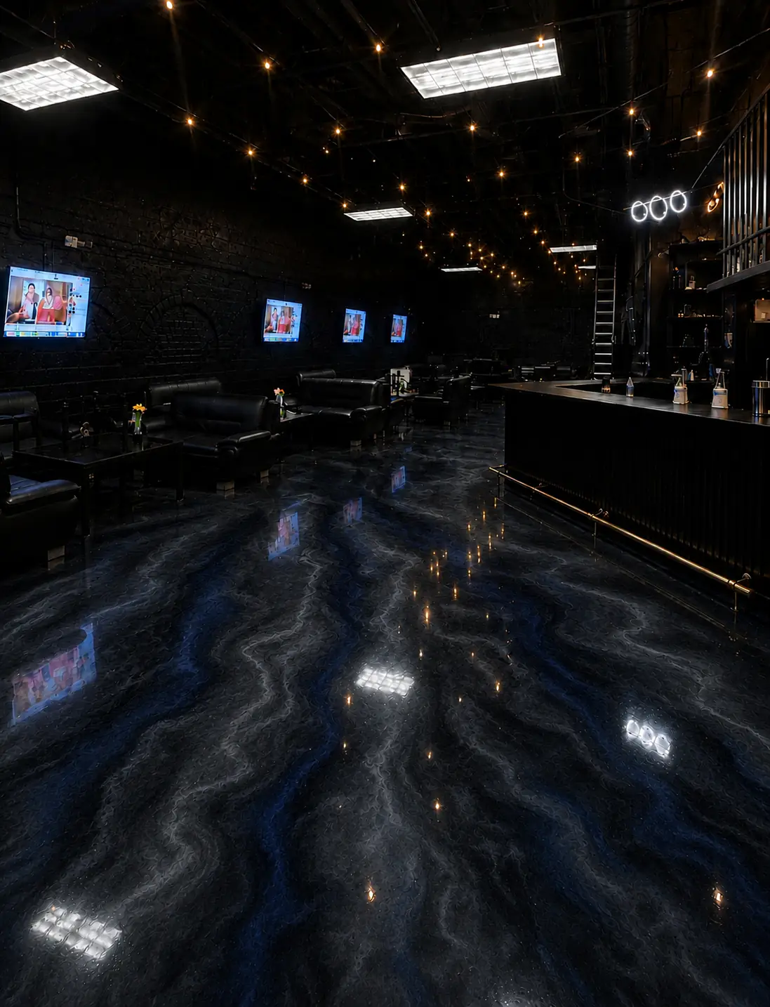 Inside Aura Lounge: leather sofas under string lights, the bar, and a dark marble floor